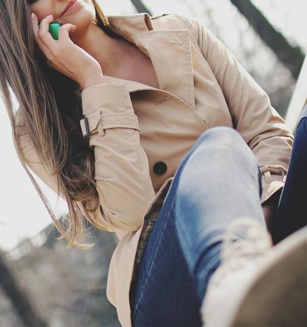 Beige trench coat woman city