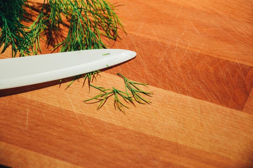 Chopping herbs with one of the best chef knives