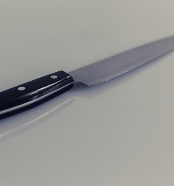 Chef knife on gray