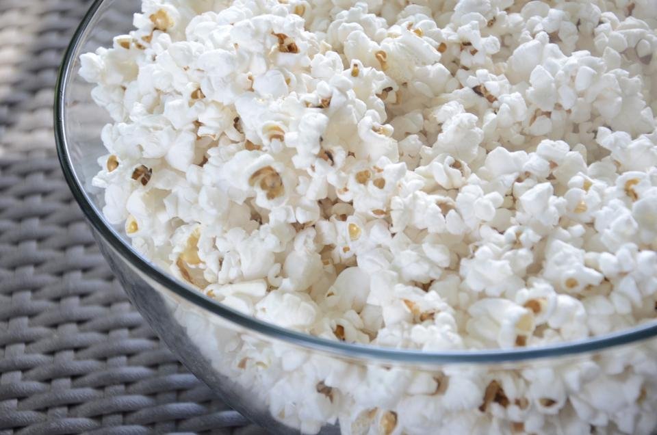Bowl of popcorn ready for a marathon of the best Christmas movies