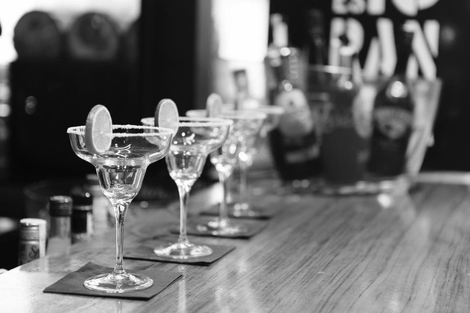 Coupe cocktail glasses on a bar for an art deco interior design look
