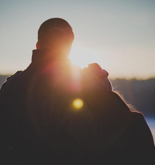 Couple backlit sunset