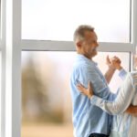 Couple dancing at home