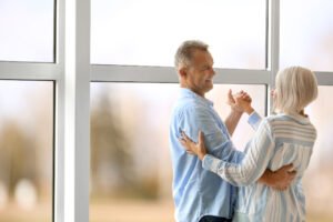 Couple dancing at home