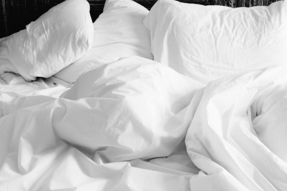 Beauty sleep products for a calm bed with crisp white pillows