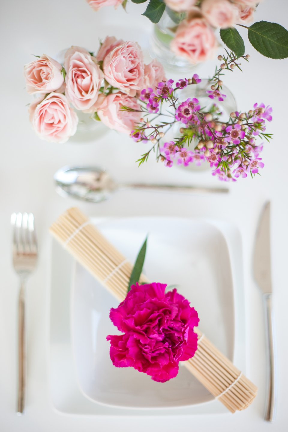 Elegant table setting with flowers, a perfect occasion for hostess gifts