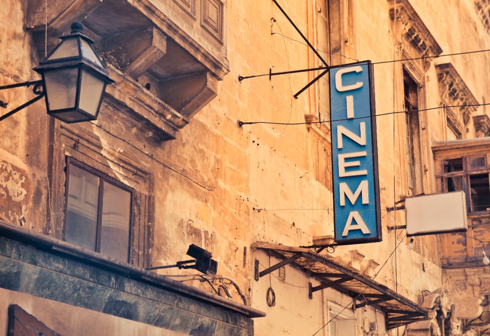 Best fashion movies cinema sign on a vintage street