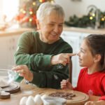 Grandmother baking with granddaughter