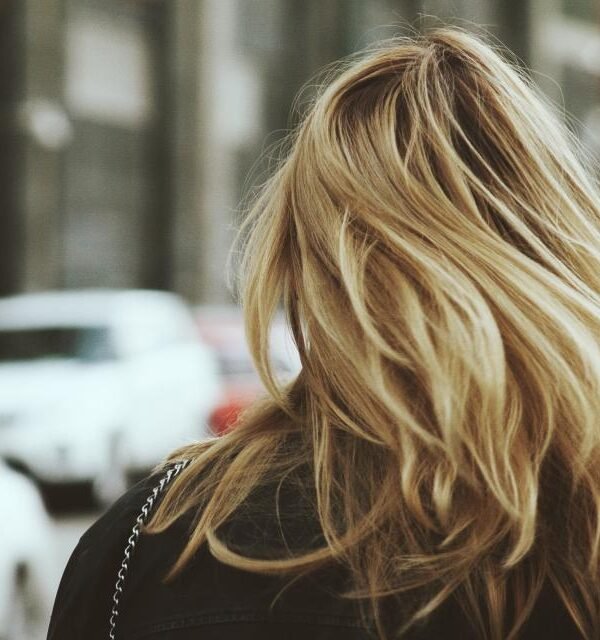 Woman with long shiny blonde hair