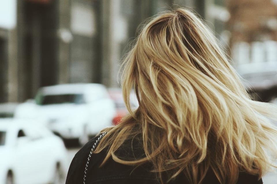 Woman with long shiny blonde hair