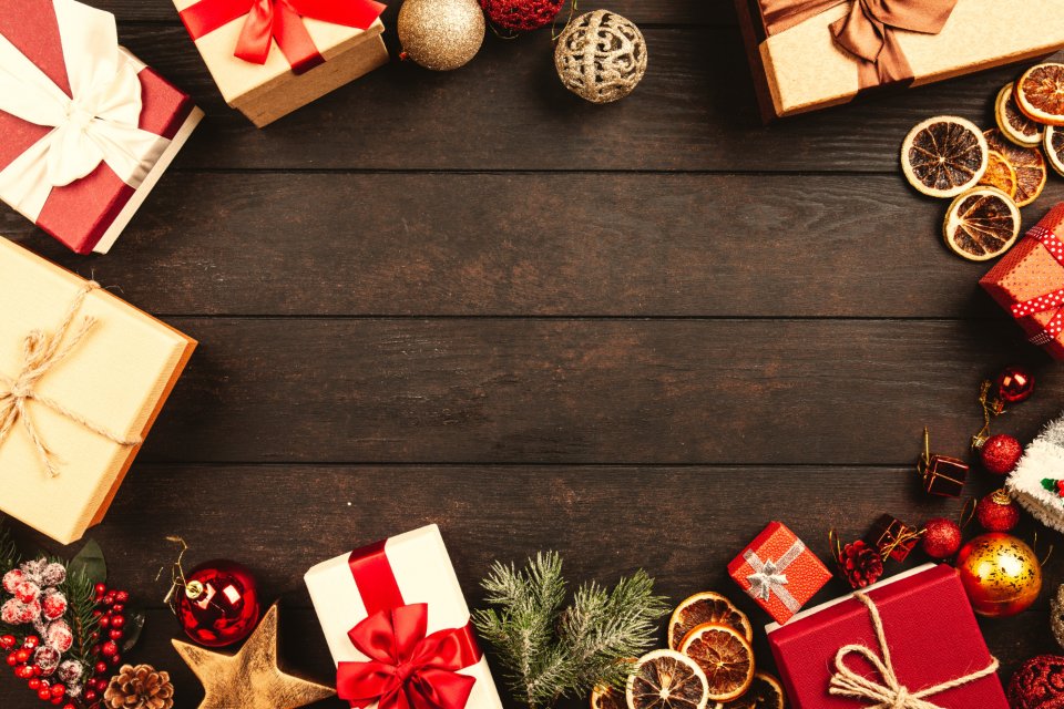 Holiday gift boxes on a wooden table