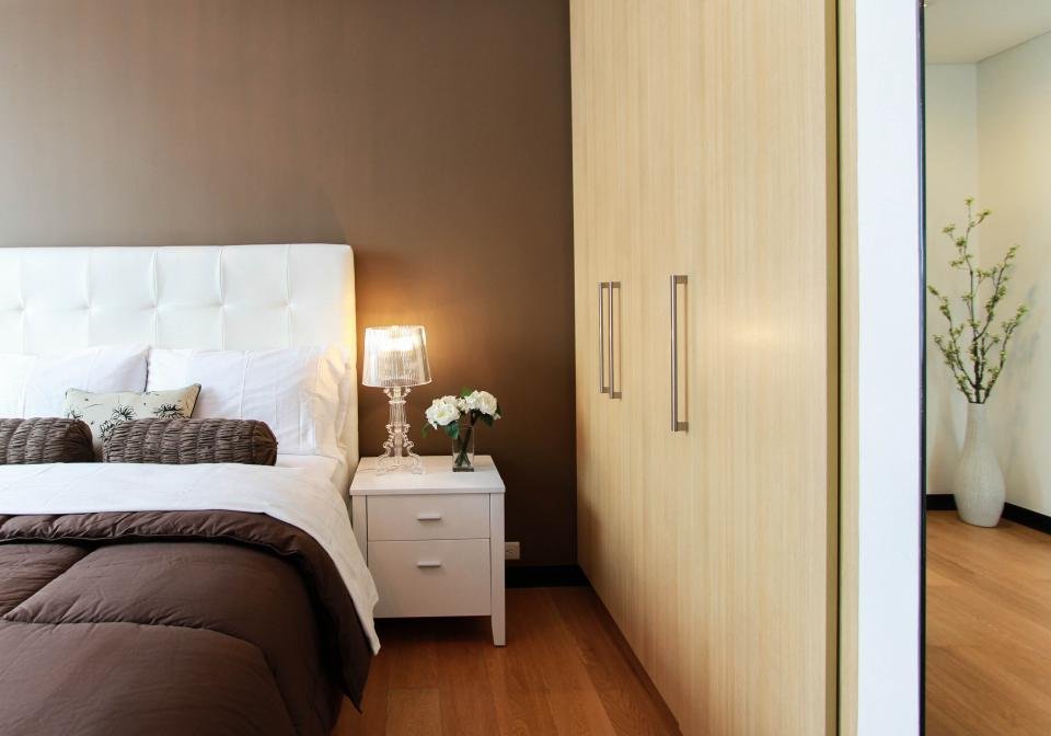 Hotel style bedroom dressed in egyptian cotton sheets