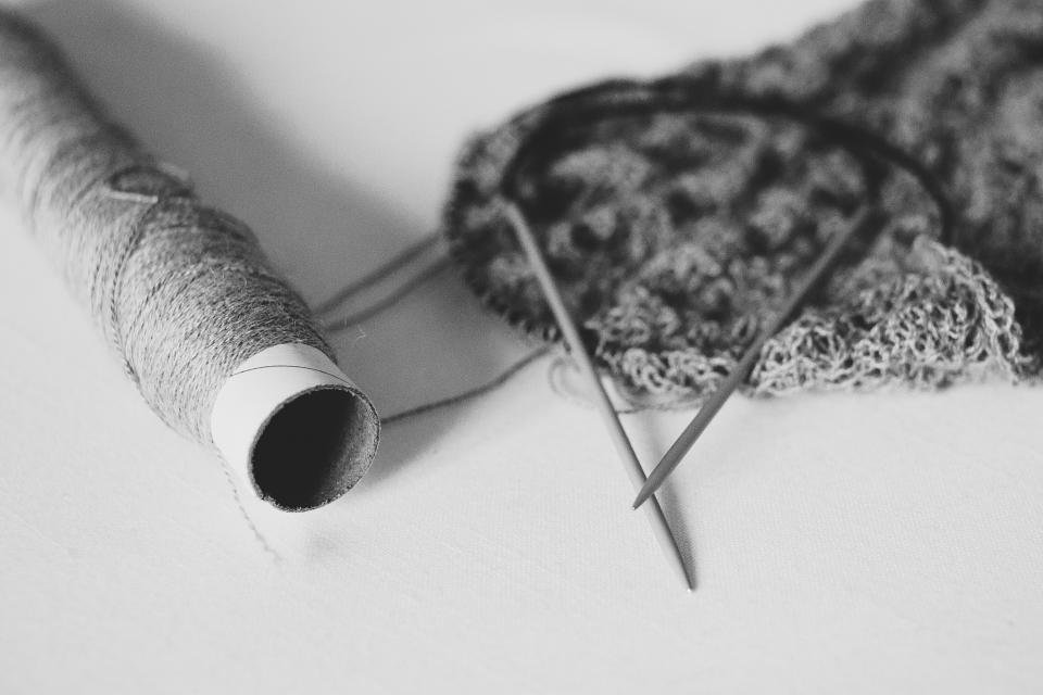 Knitting yarn and needles, a hobby to consider when picking gifts for grandma