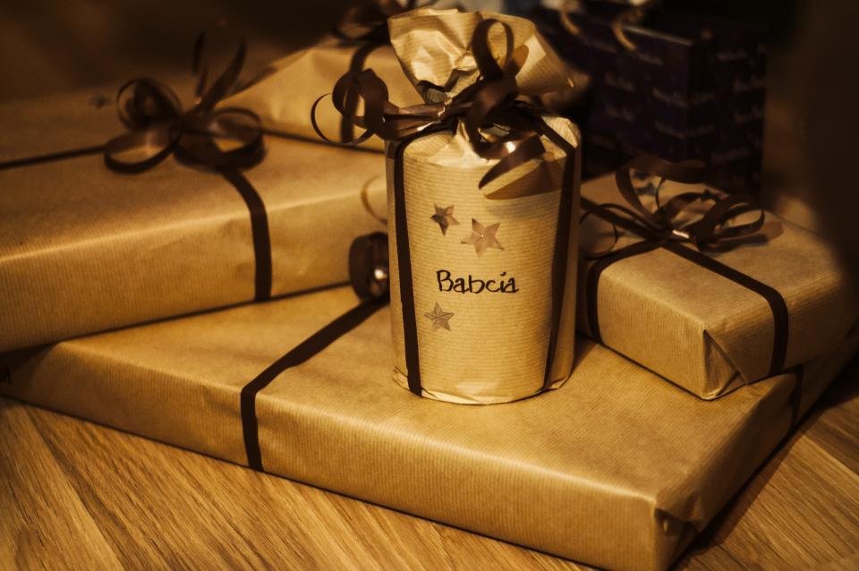 Kraft paper wrapped white elephant gifts ready for a party