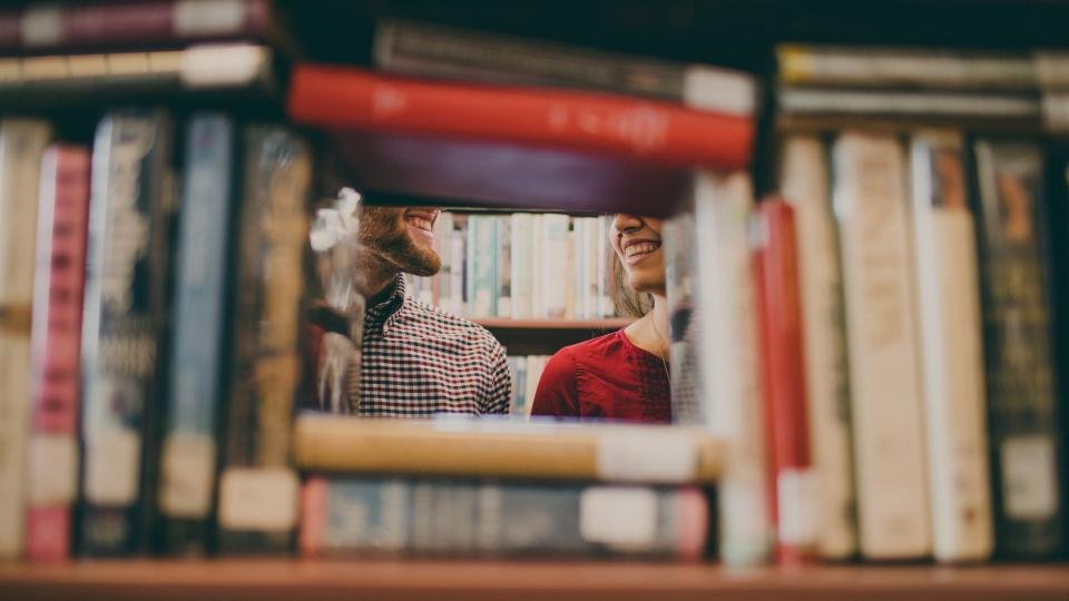 Library shelves with books on politics and leadership