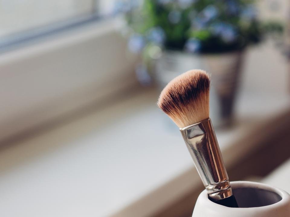 Makeup foundation brush in soft window light