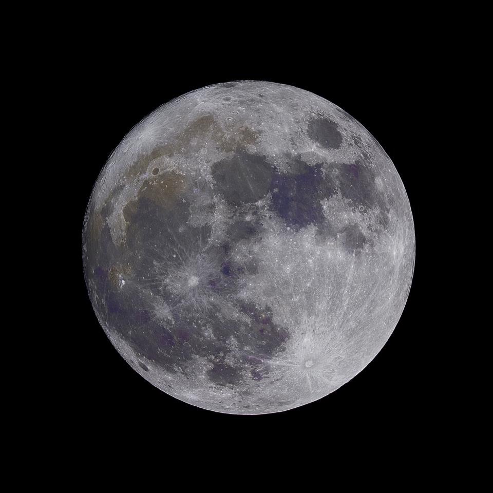 Moon sign meaning illustrated by a detailed full moon in a dark sky
