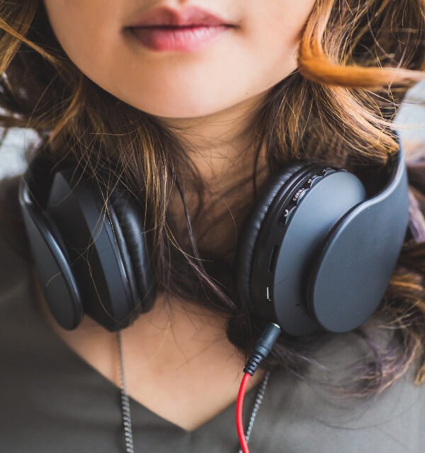Noise cancelling headphones woman