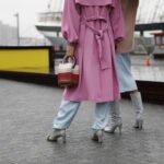 Pink coat boots street style