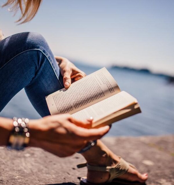 Reading art book seaside