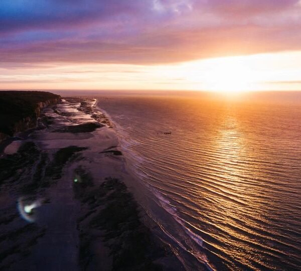 Rising sign sunrise over sea