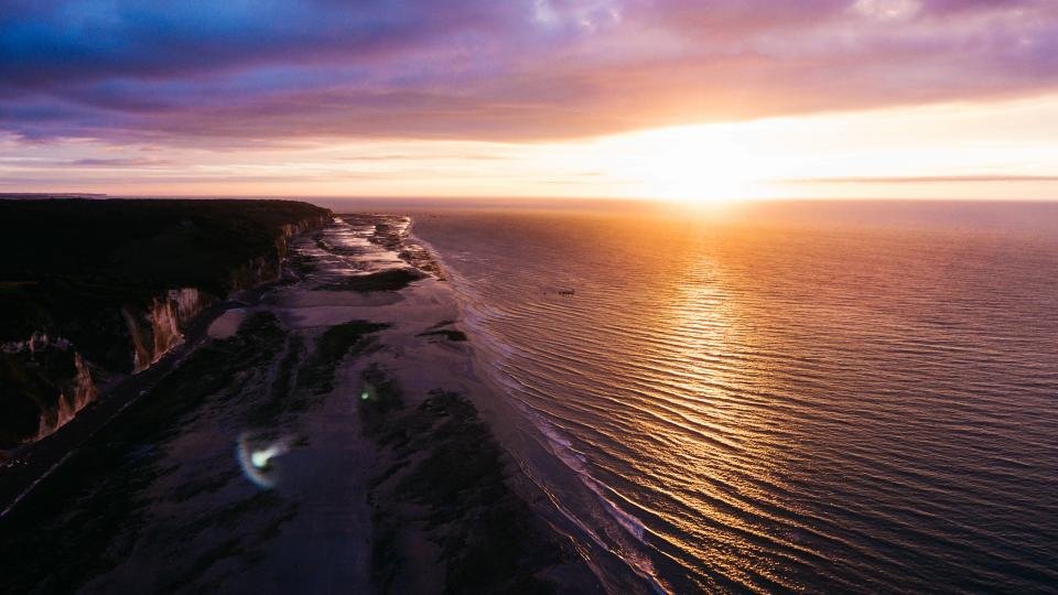 Rising sign sunrise over sea