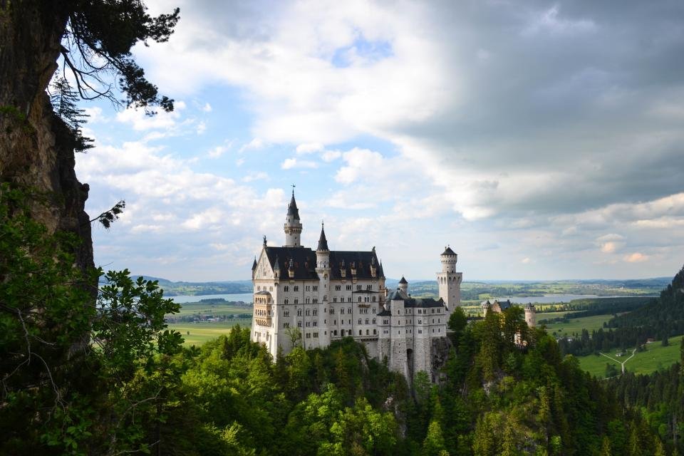 Fairy tale castle above a lake, the setting of many royal love stories