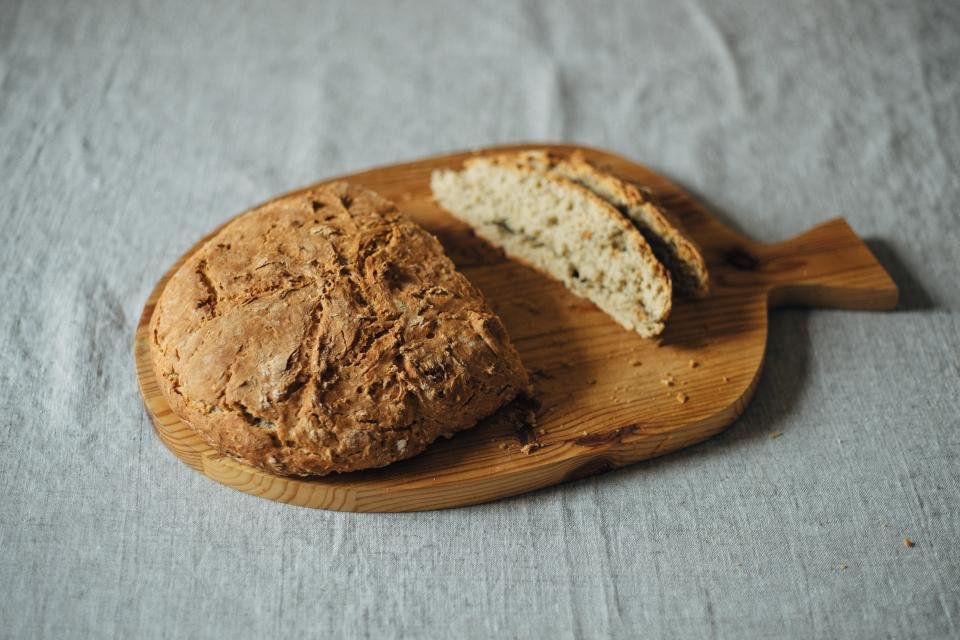 Rustic homemade bread loaf on a wooden board