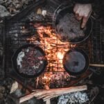 Seasoned cast iron campfire grill
