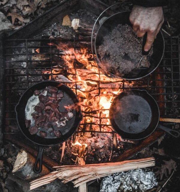 Seasoned cast iron campfire grill