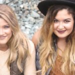 Sisters smiling together