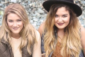 Sisters smiling together