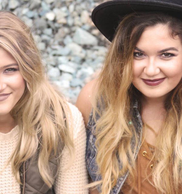 Sisters smiling together