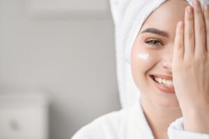 Skincare lover smiling towel