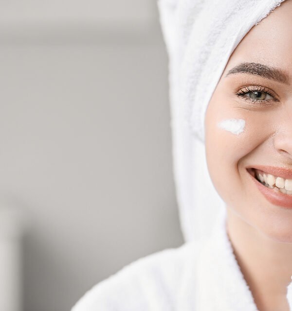 Skincare lover smiling towel
