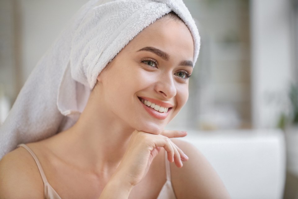 Woman following her evening skincare routine