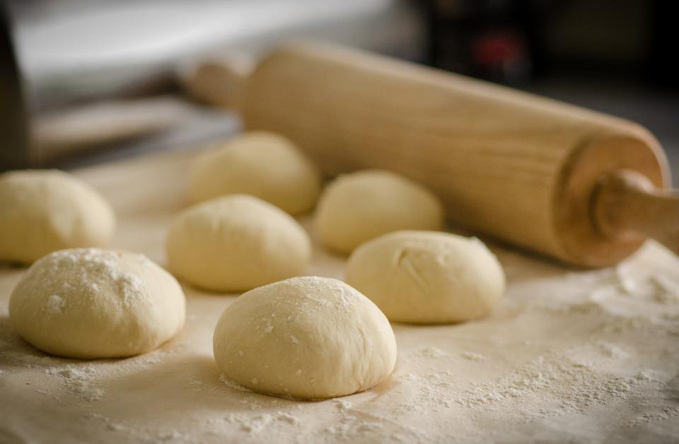 Best stand mixer results with proofed dough balls on a floured counter