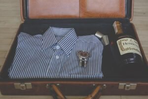 Suitcase packing shirt