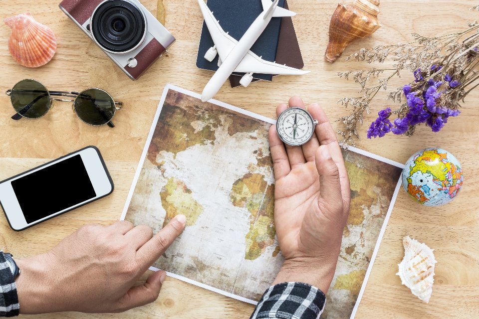 Travel flatlay map phone