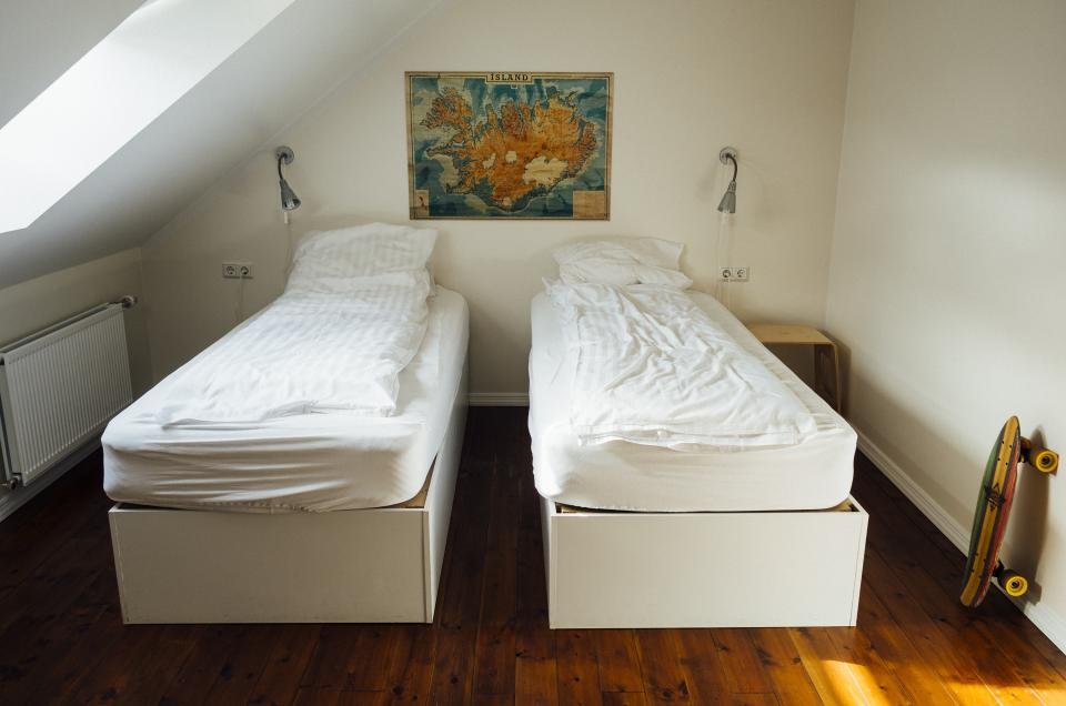 Twin beds in a sunny guest bedroom