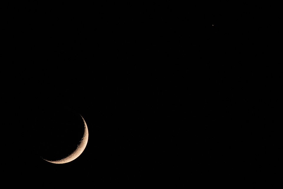 Weekly horoscope November 9 to 15 2026 with a crescent moon in a dark sky