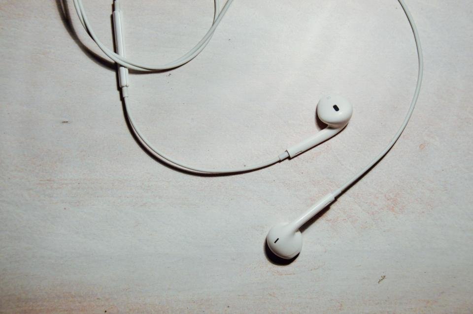 Wireless earbuds compared with classic wired earbuds