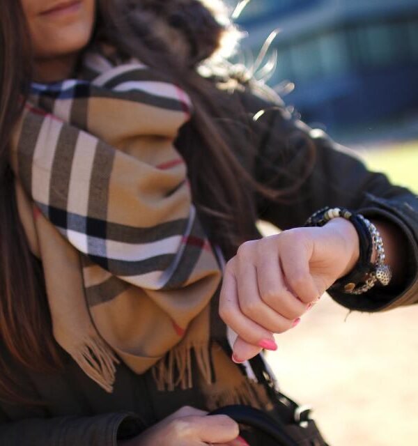 Woman checking watch