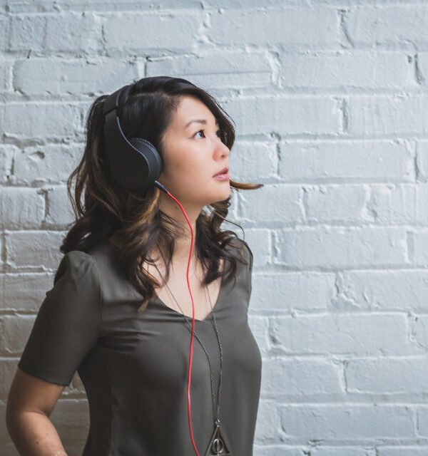 Woman listening music wall