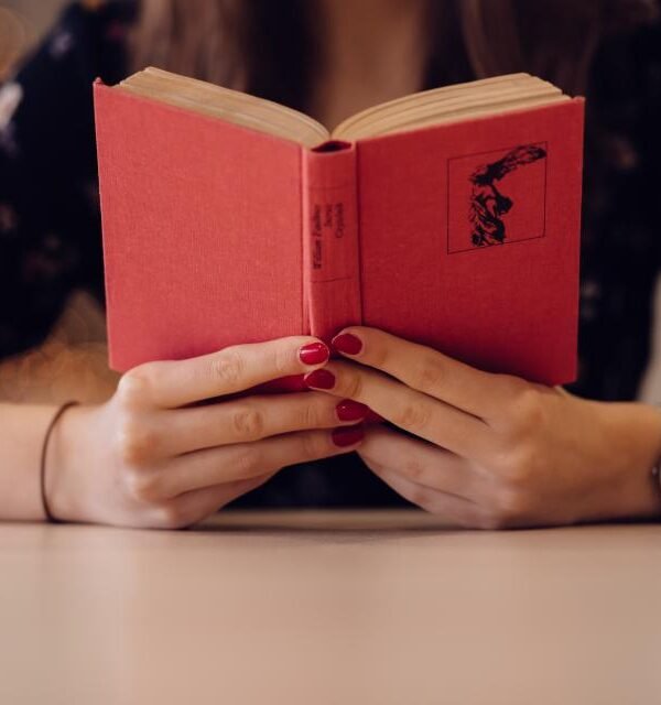 Woman reading red book