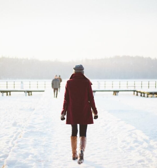 Woman snow walk red coat