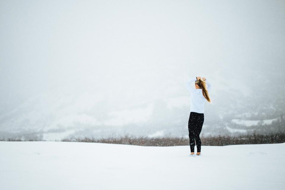 Woman snowy field