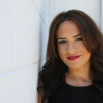Woman wavy hair heat styled