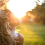 Woman with wavy hair sunlight