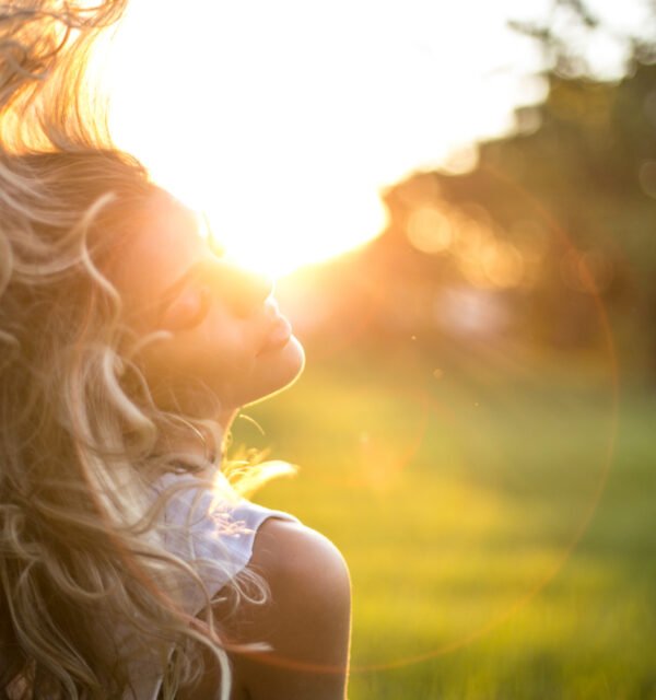 Woman with wavy hair sunlight